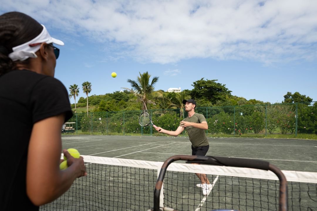 Tennis instructor and guest
